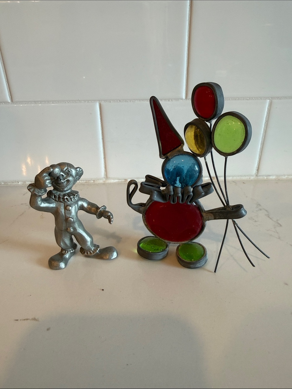 Colorful Clown Figurine with Balloons and additional clown